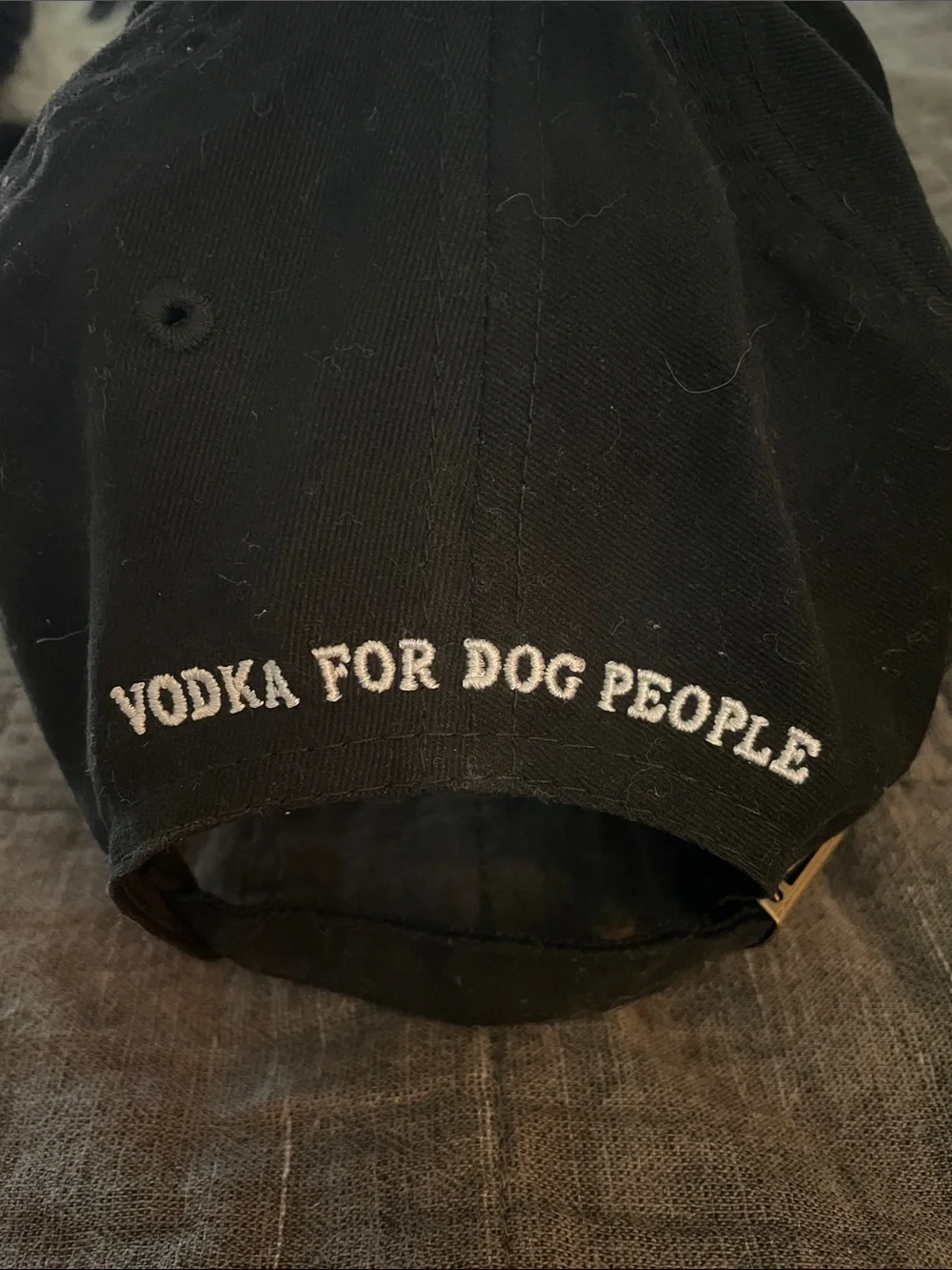 Tito’s Vodka Black Baseball Cap with White Dog Embroidered Accent